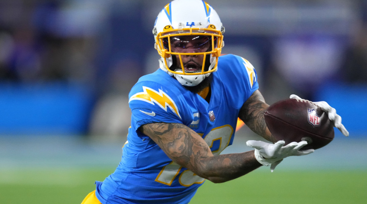Dec 11, 2022; Inglewood, California, USA; Los Angeles Chargers wide receiver Keenan Allen (13) catches the ball in the second half against the Miami Dolphins at SoFi Stadium. Mandatory Credit: Kirby Lee-USA TODAY Sports